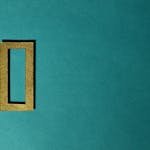 A gold rectangular frame casting a shadow on a teal background, minimal and artistic.